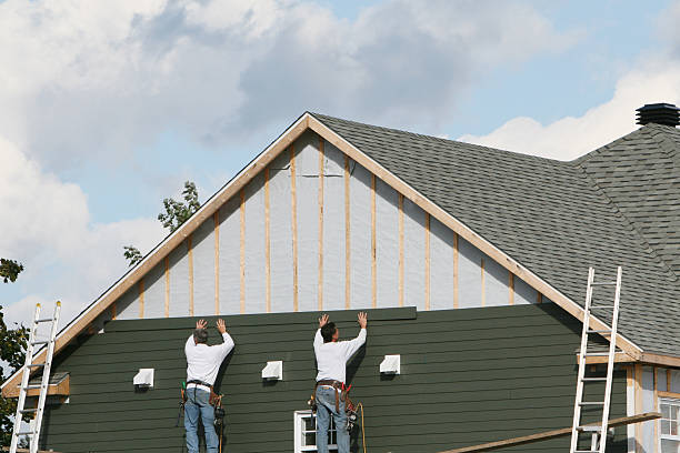 Professional Siding technician working in Lowber, PA